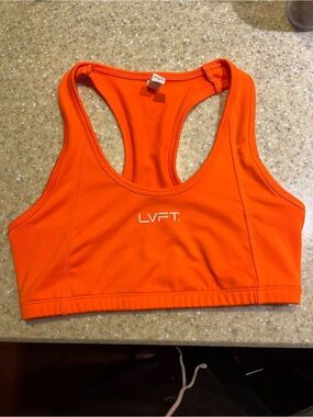 LVFT Women's Racerback Sports Bra in Bright Orange